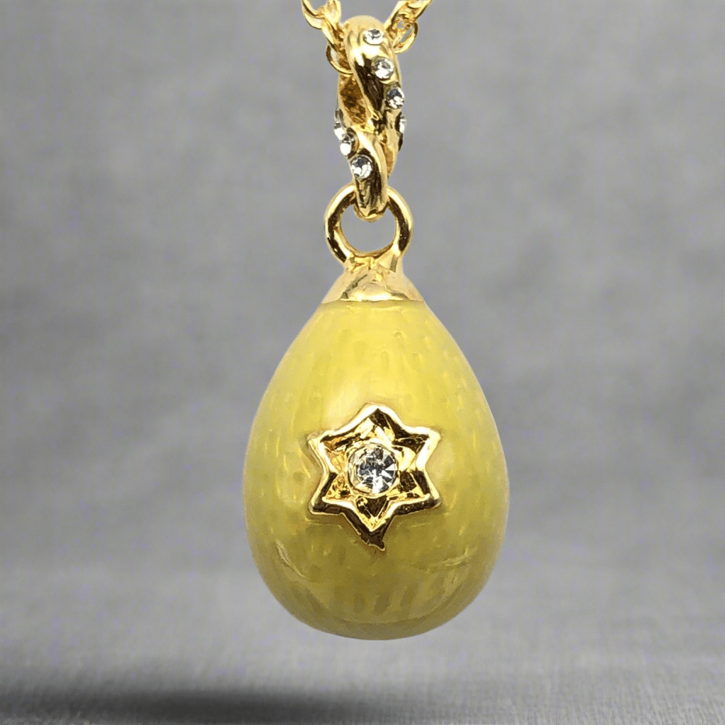 Close-up view of yellow gold Star of David pendant showcasing intricate detailing and fine craftsmanship